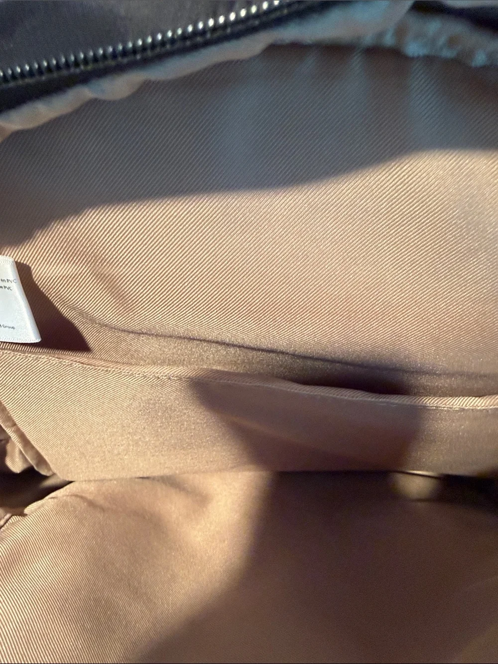 Allancia Black Nylon Backpack with Gold Accent Plaque